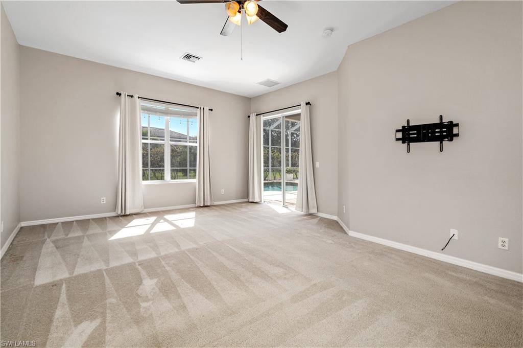 12446 Rock Ridge Lane Fort Myers, FL 33913 - Photo 7 of 38 a view of an empty room with a window