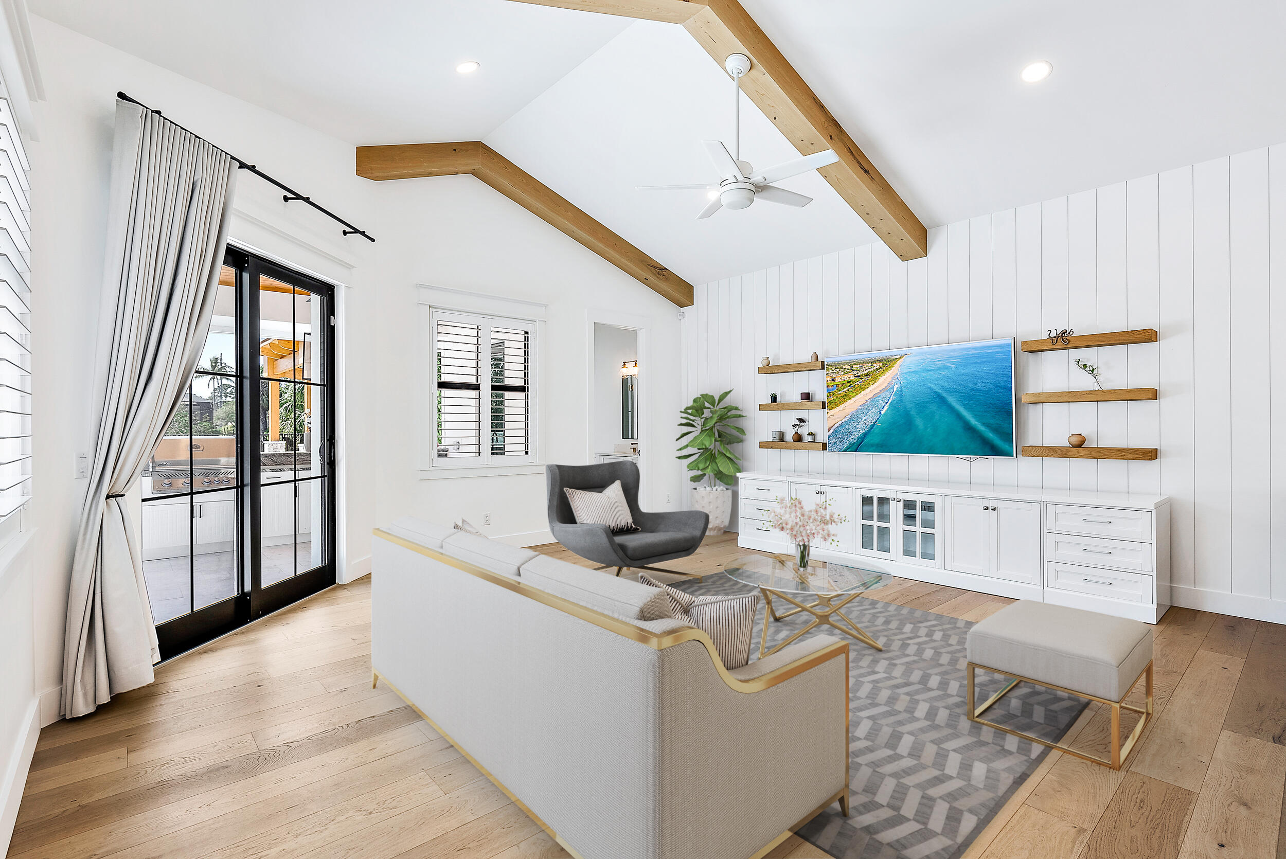 18764 Southeast Jupiter River Drive Jupiter, FL 33458 - Photo 31 of 67 a living room with furniture and a flat screen tv