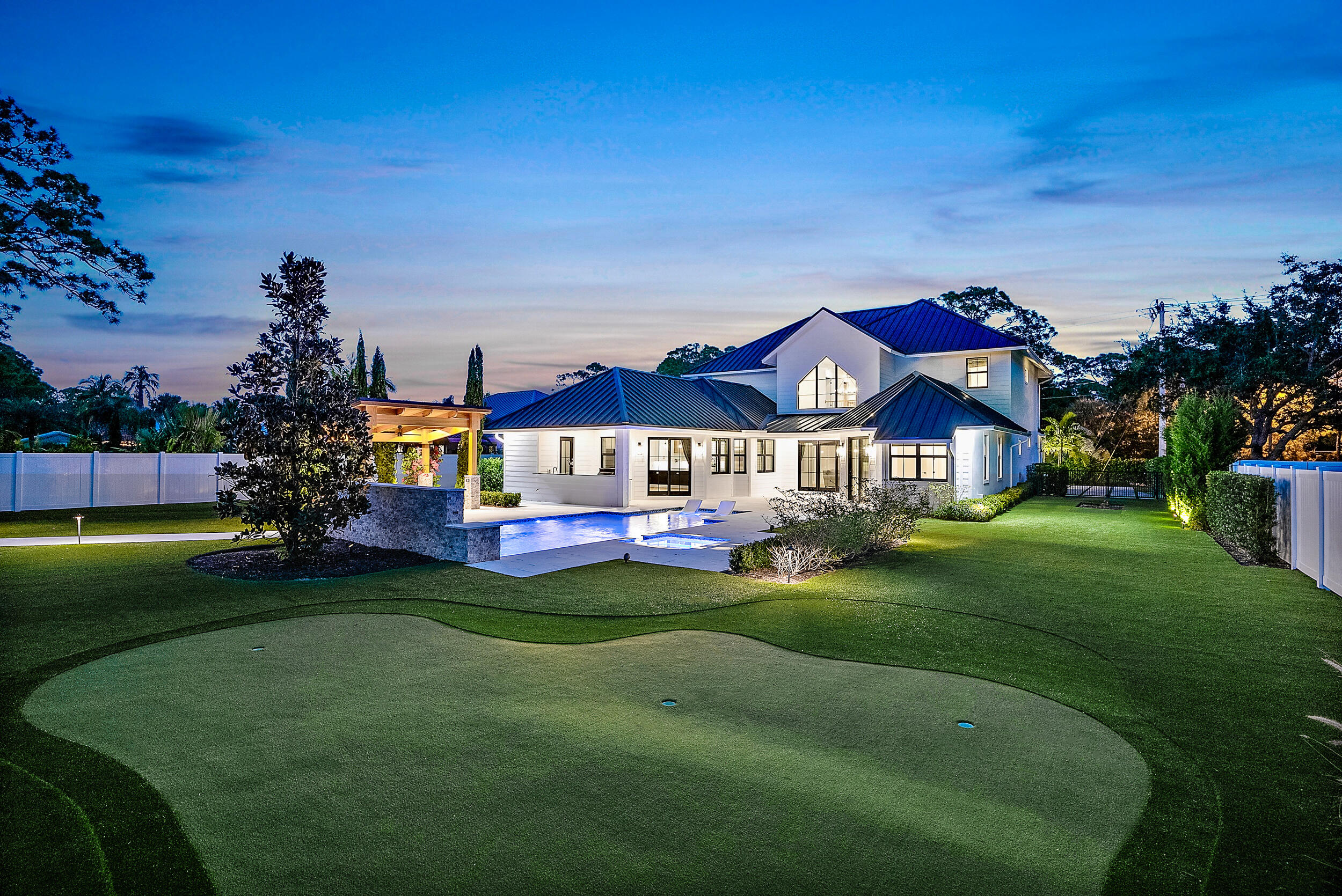 18764 Southeast Jupiter River Drive Jupiter, FL 33458 - Photo 4 of 67 a view of house with garden