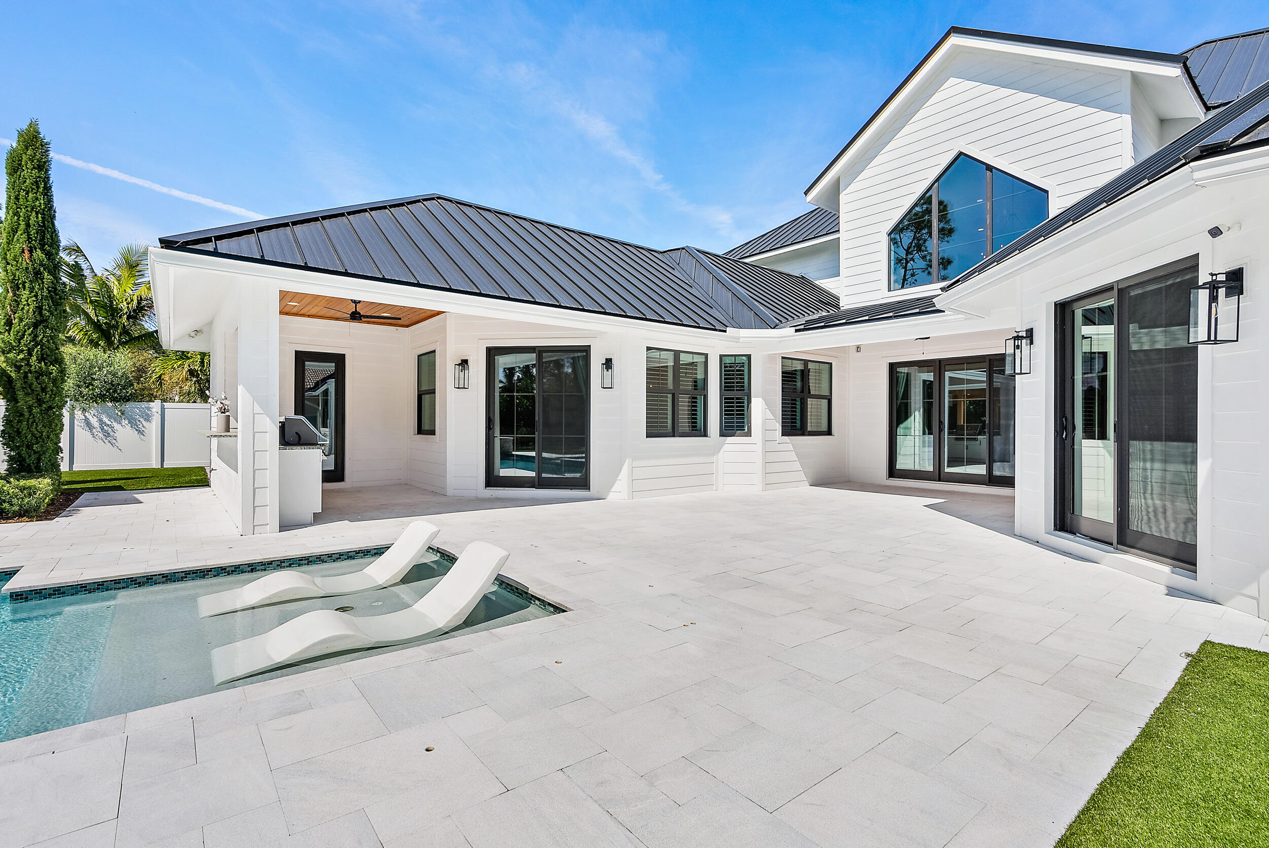 18764 Southeast Jupiter River Drive Jupiter, FL 33458 - Photo 58 of 67 a house view with a outdoor space