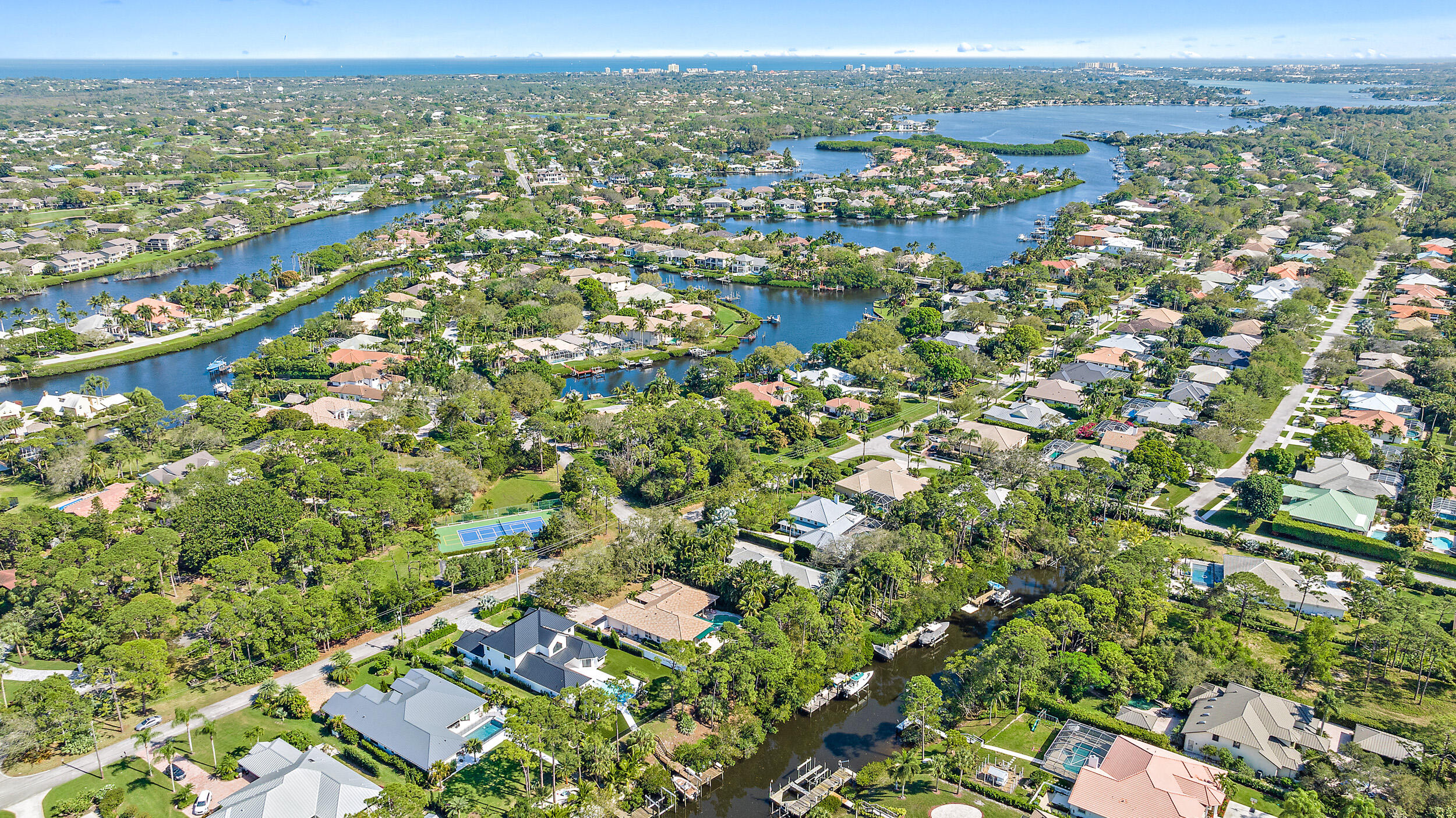 18764 Southeast Jupiter River Drive Jupiter, FL 33458 - Photo 67 of 67 an aerial view of residential houses with outdoor space