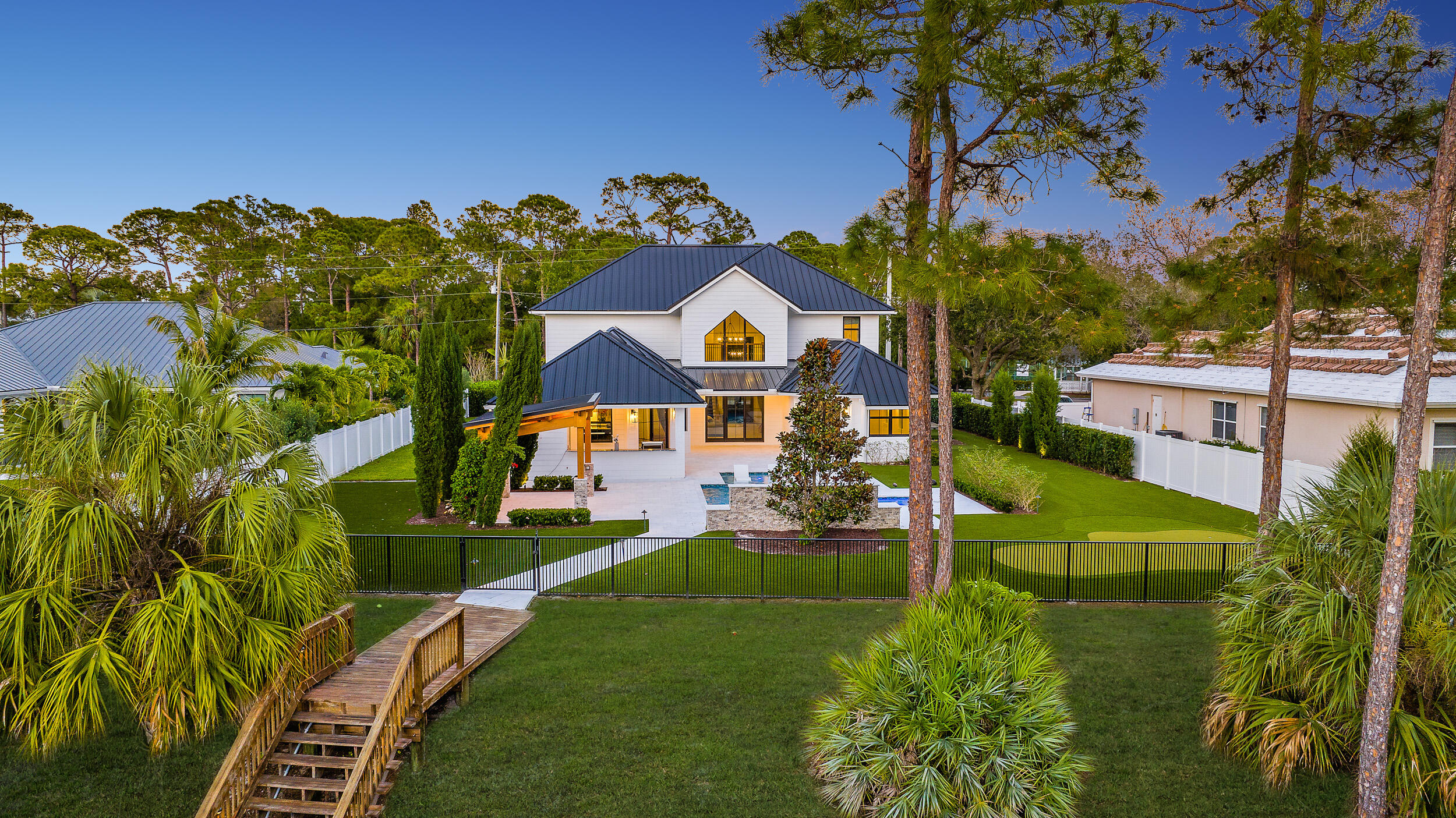 18764 Southeast Jupiter River Drive Jupiter, FL 33458 - Photo 9 of 67 Exterior Twilight