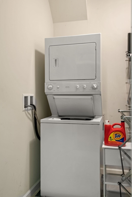 204 Clocktower Drive, Unit 202 Waltham, MA 02452 - Photo 19 of 25 a utility room with dryer and washer
