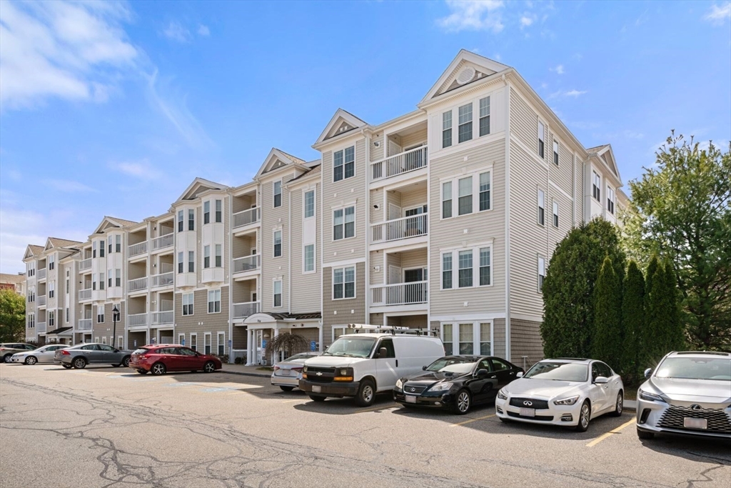 204 Clocktower Drive, Unit 202 Waltham, MA 02452 - Photo 22 of 25 a building view