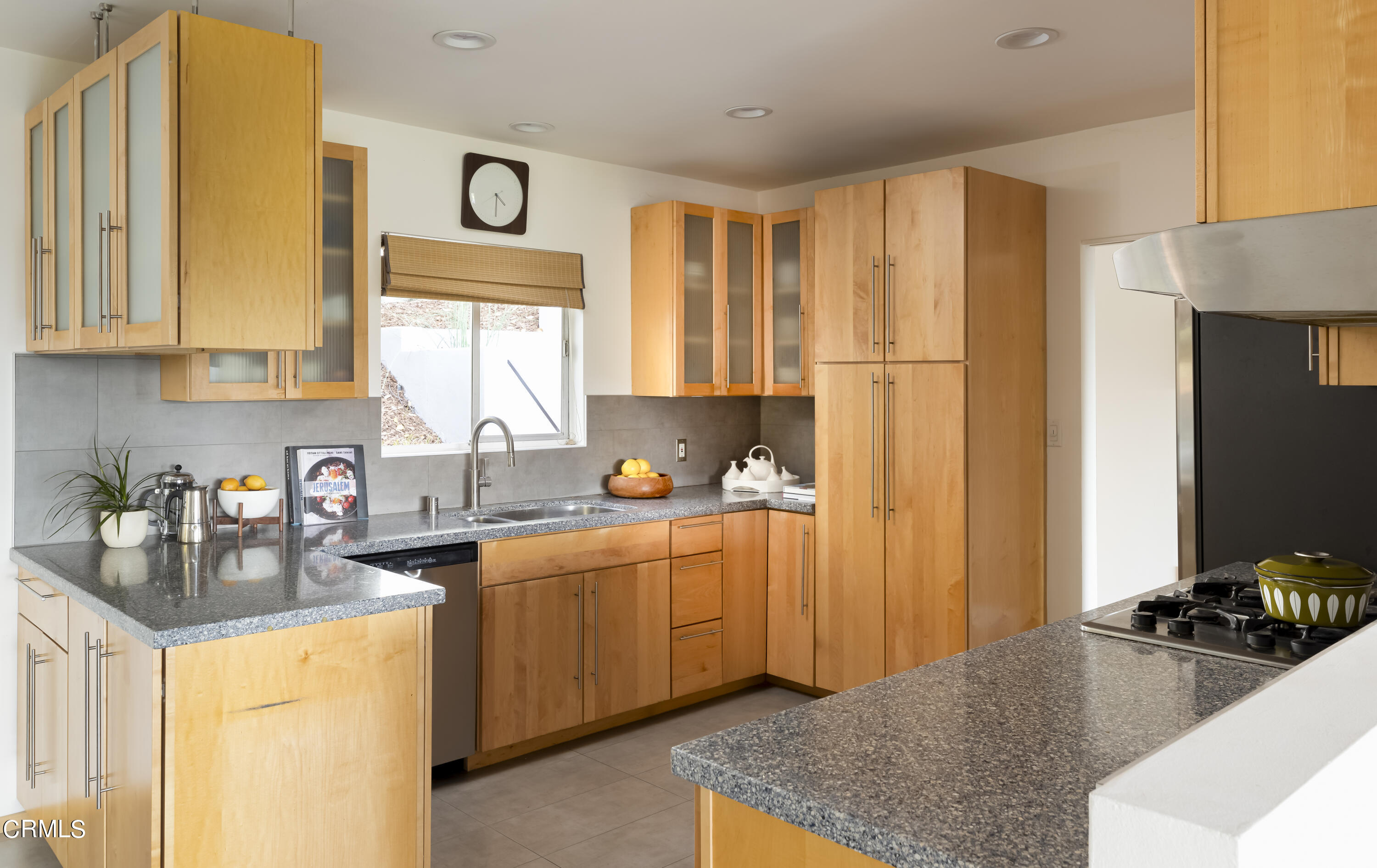 329 Redwood Drive Pasadena, CA 91105 - Photo 12 of 32 a kitchen with stainless steel appliances granite countertop a sink stove and refrigerator