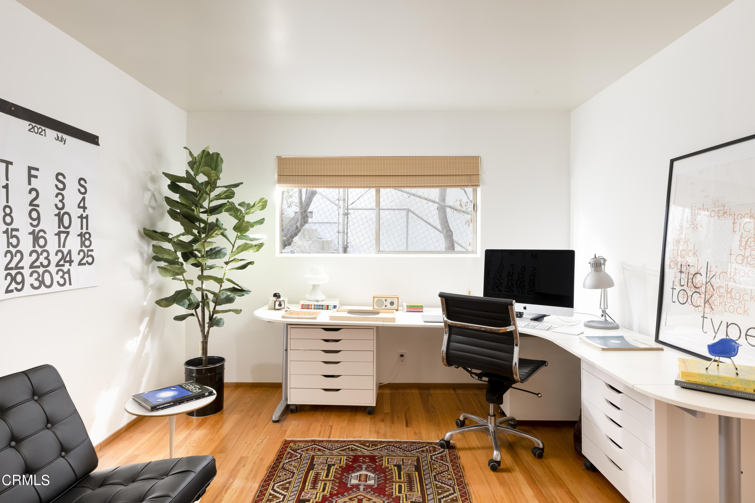 329 Redwood Drive Pasadena, CA 91105 - Photo 23 of 32 a workspace with furniture and a potted plant