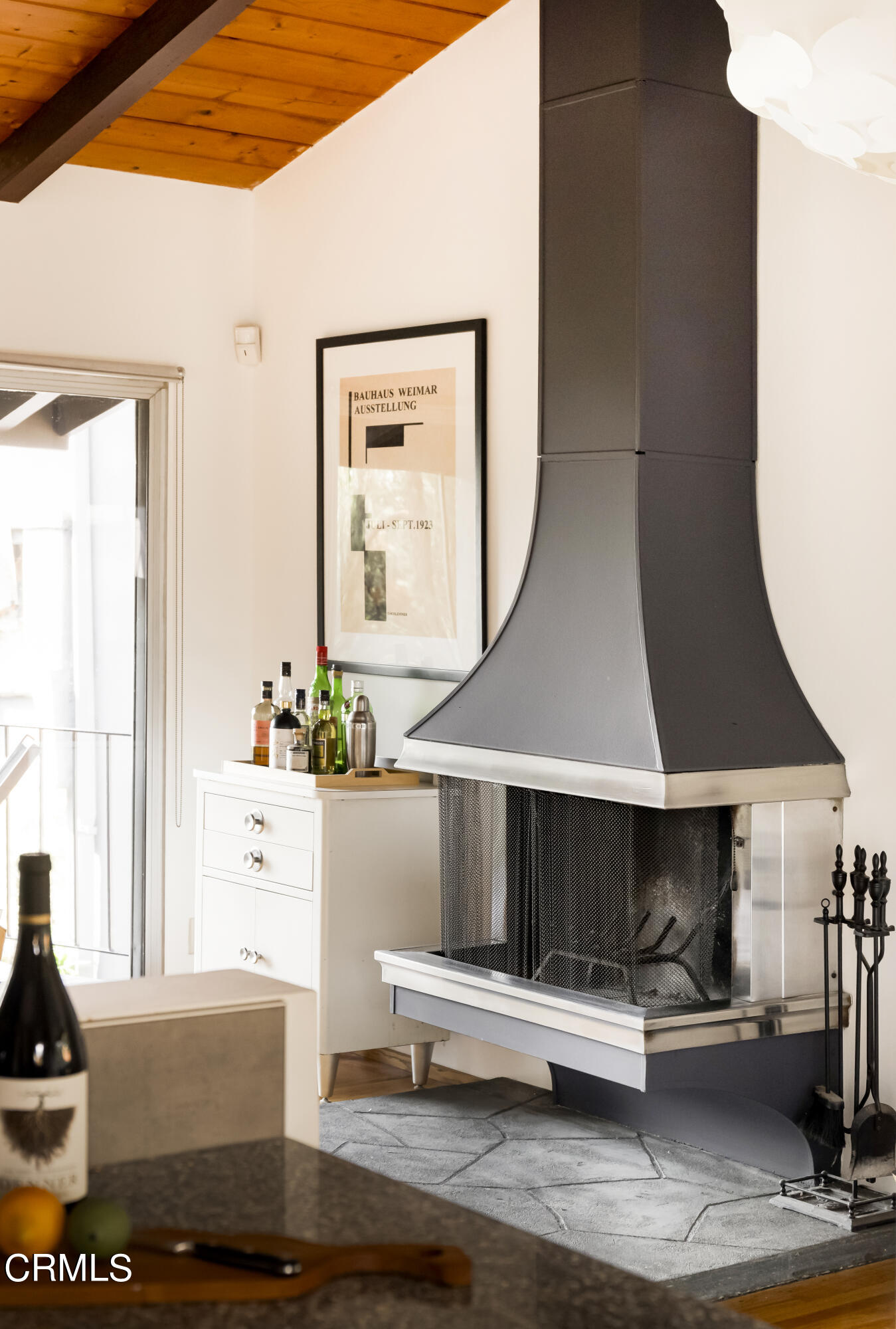 329 Redwood Drive Pasadena, CA 91105 - Photo 9 of 32 a living room with a couch and a potted plant