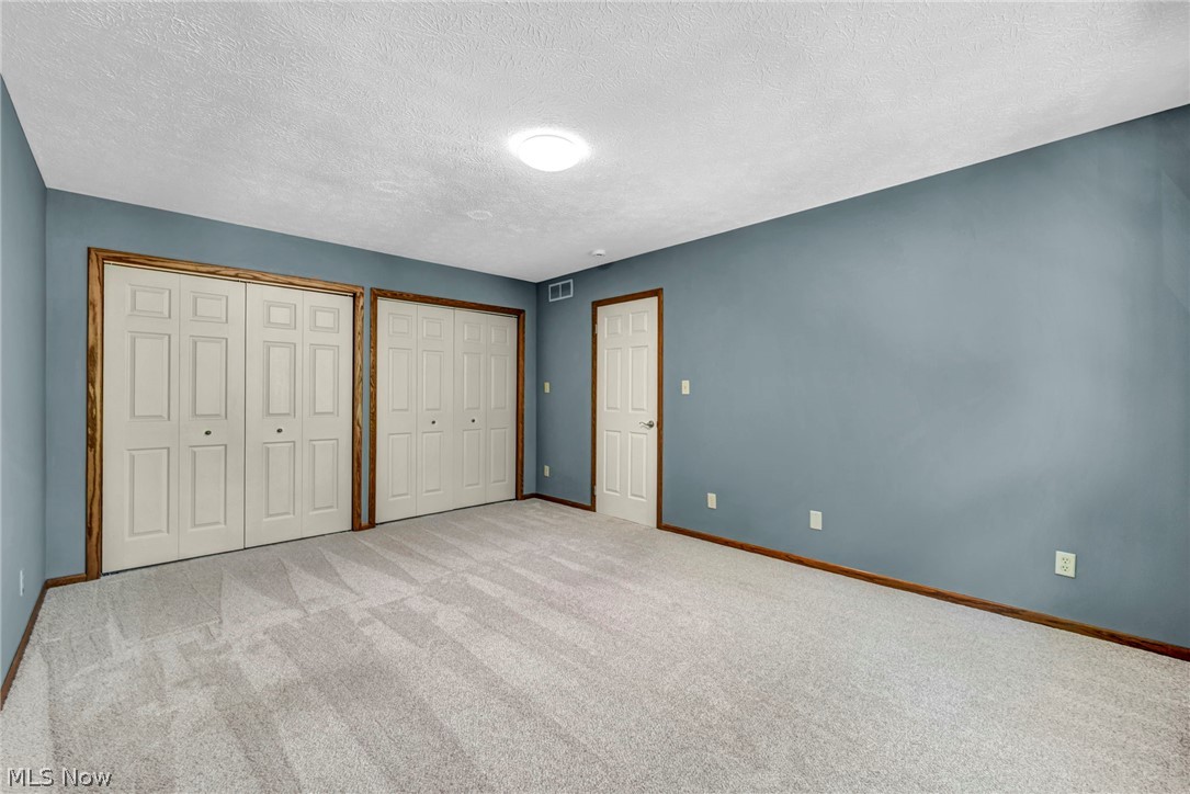 1057 Congress Lake Road Mogadore, OH 44260 - Photo 27 of 50 Final bedroom on the second floor with double closets