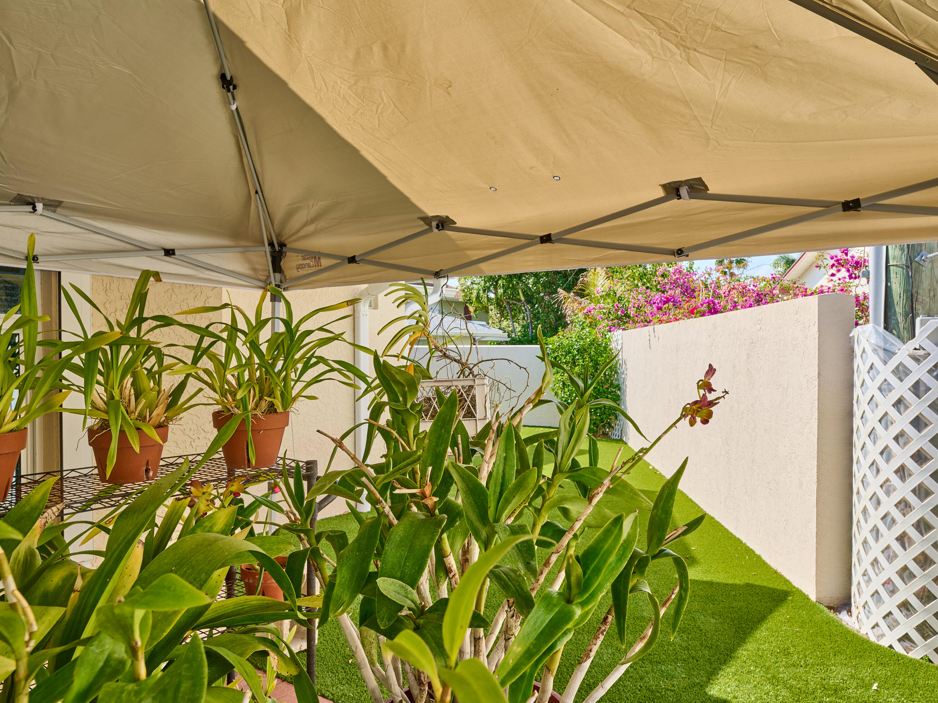 471 Neptune Road Juno Beach, FL 33408 - Photo 8 of 13 a view of an outdoor space