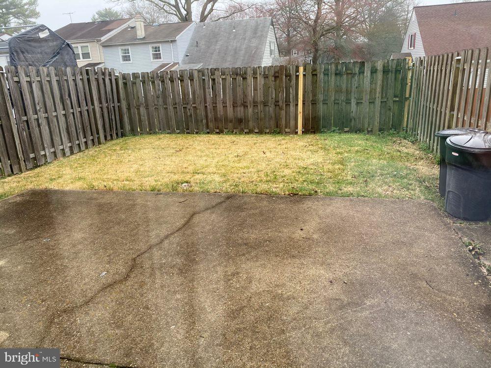 12427 Persimmon Road Upper Marlboro, MD 20772 - Photo 18 of 18 Backyard Patio & Fully Fenced Yard