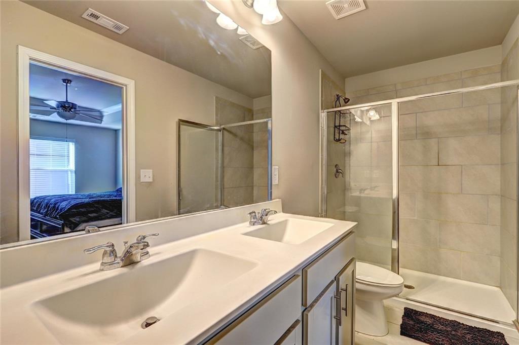 1123 Elyse Lane Mableton, GA 30126 - Photo 13 of 29 a bathroom with a sink toilet and shower