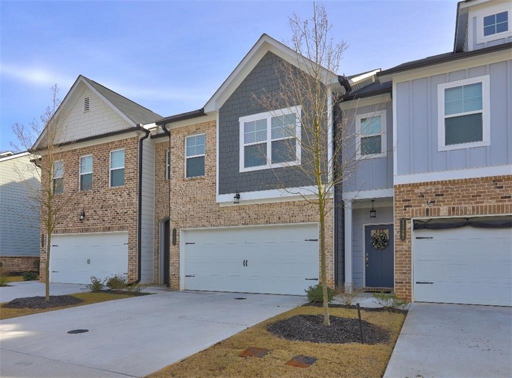 1123 Elyse Lane Mableton, GA 30126 - Photo 26 of 29 a front view of a house with garden