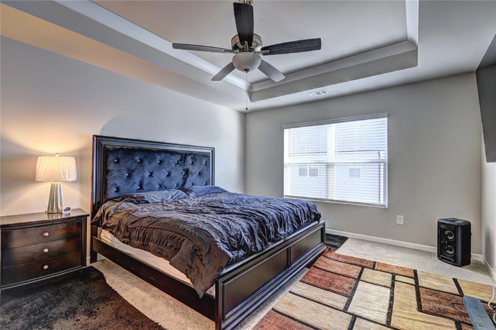 1123 Elyse Lane Mableton, GA 30126 - Photo 10 of 29 a bedroom with a bed and window