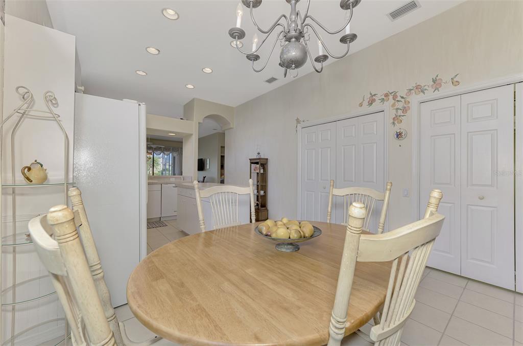 3413 Pennyroyal Road Port Charlotte, FL 33953 - Photo 27 of 88 a view of a dining room with furniture