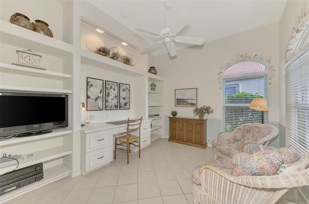 3413 Pennyroyal Road Port Charlotte, FL 33953 - Photo 36 of 88 a living room with furniture and a flat screen tv
