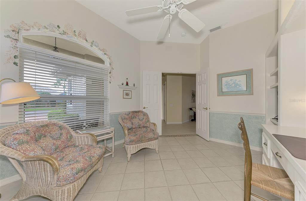 3413 Pennyroyal Road Port Charlotte, FL 33953 - Photo 37 of 88 a living room with furniture and a window