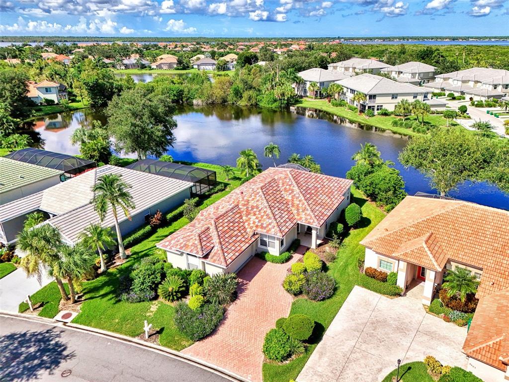 3413 Pennyroyal Road Port Charlotte, FL 33953 - Photo 62 of 88 an aerial view of a house with a lake view