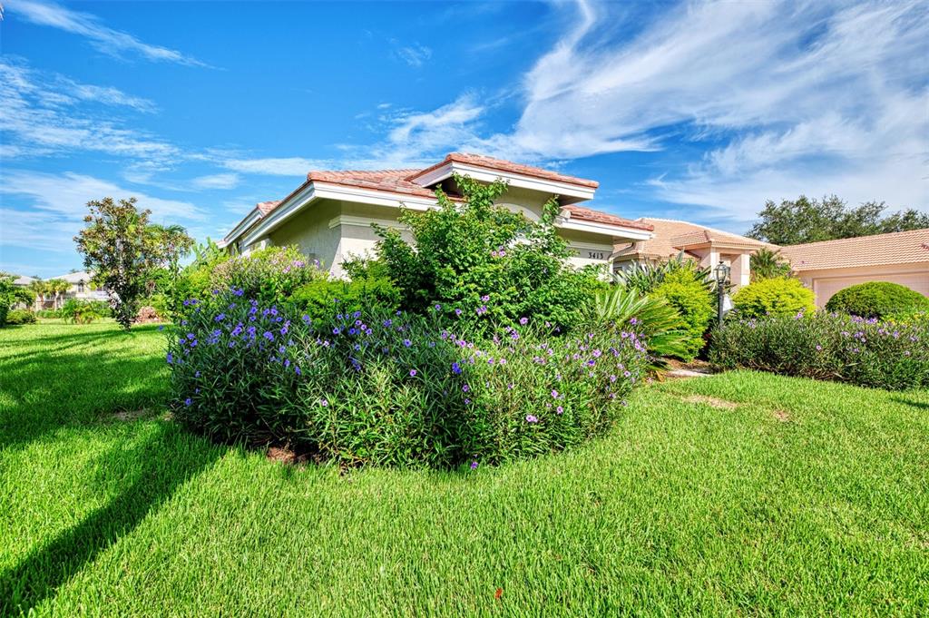 3413 Pennyroyal Road Port Charlotte, FL 33953 - Photo 63 of 88 a backyard of a house with lots of green space