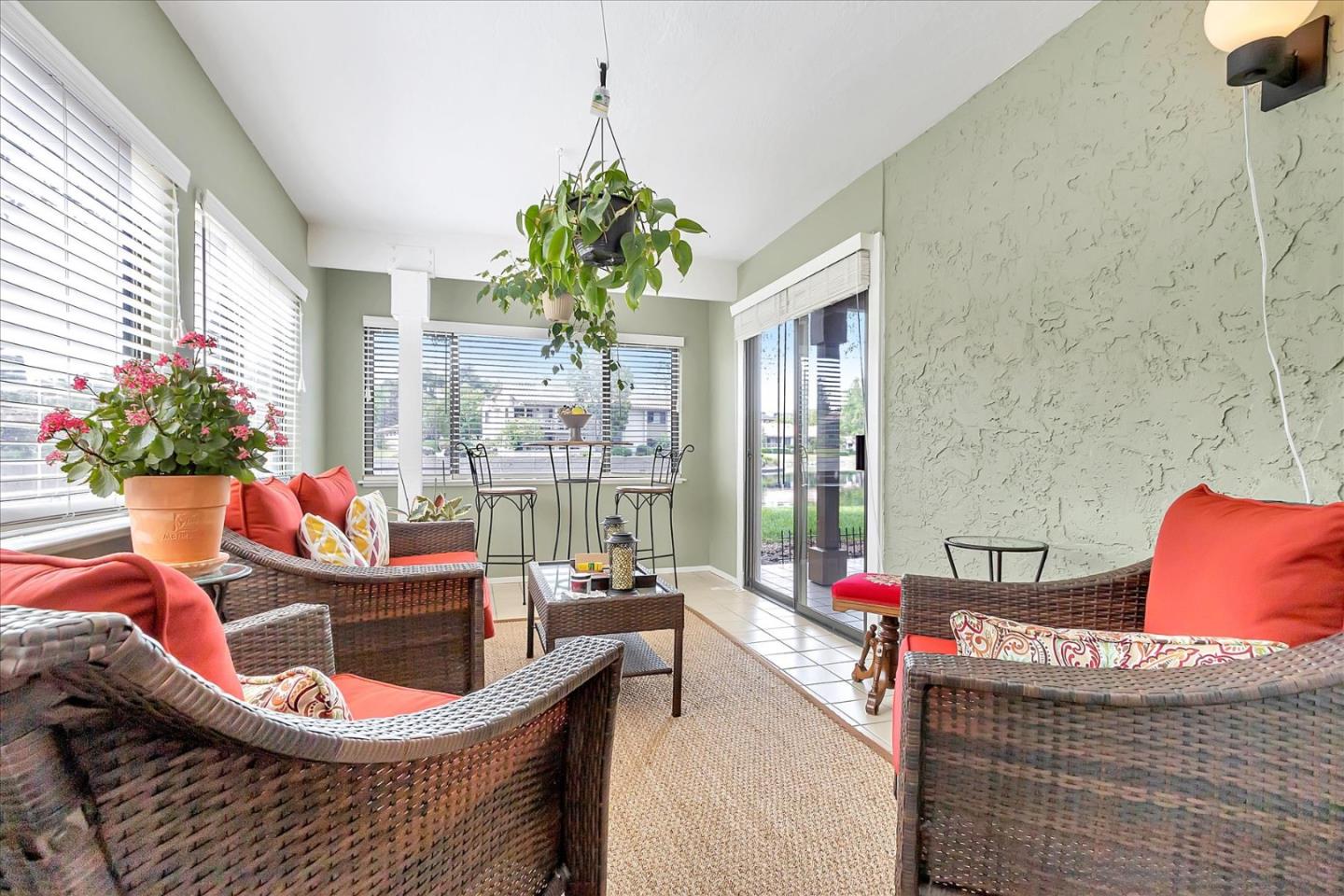 8387 Riesling Way San Jose, CA 95135 - Photo 13 of 52 a living room filled with furniture and a chandelier