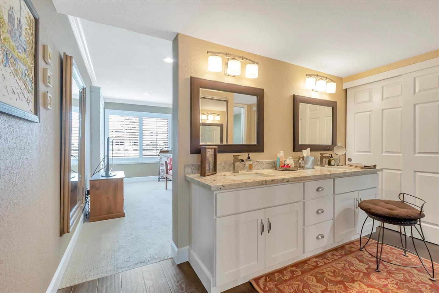 8387 Riesling Way San Jose, CA 95135 - Photo 22 of 52 a room with two chairs and a table