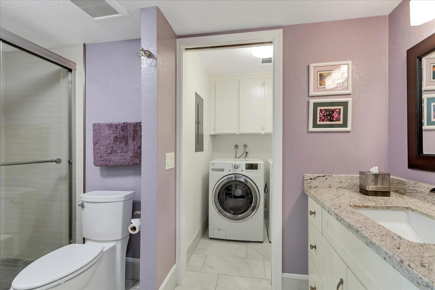 8387 Riesling Way San Jose, CA 95135 - Photo 27 of 52 a bathroom with a granite countertop toilet sink and mirror