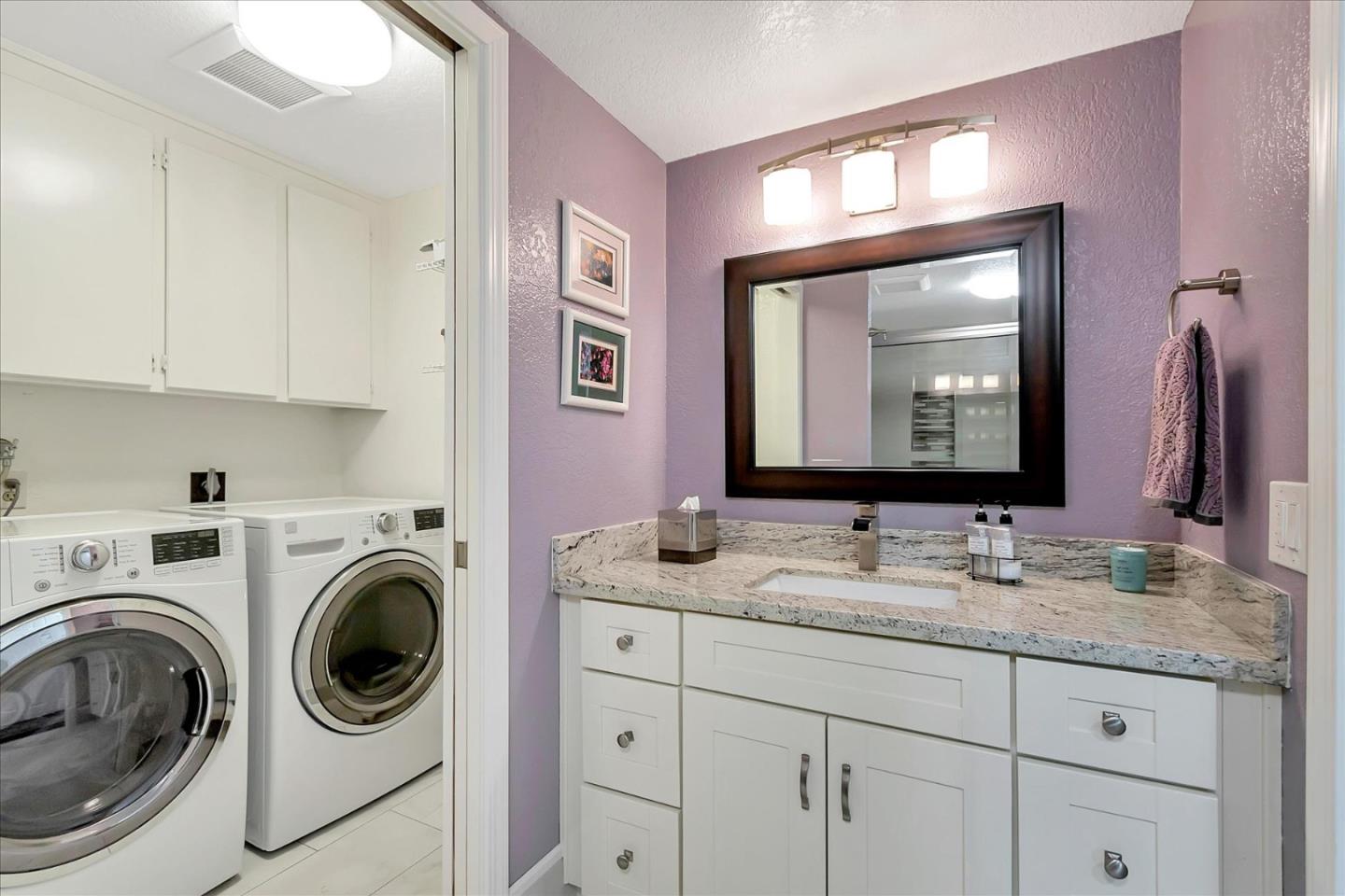 8387 Riesling Way San Jose, CA 95135 - Photo 29 of 52 a bathroom with a granite countertop double vanity sink and a mirror