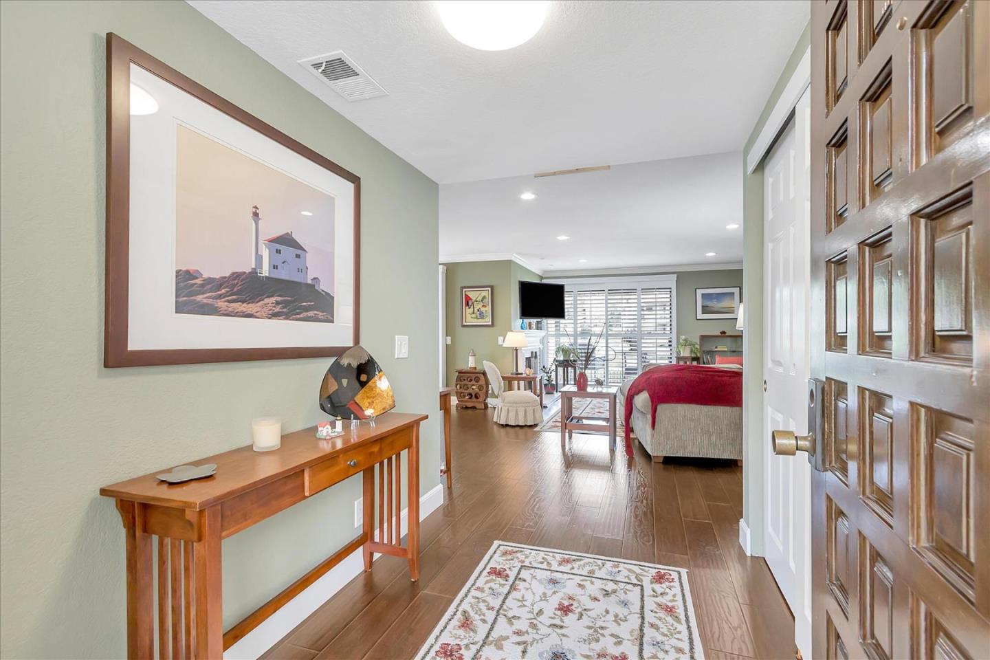 8387 Riesling Way San Jose, CA 95135 - Photo 31 of 52 a living room with furniture and wooden floor