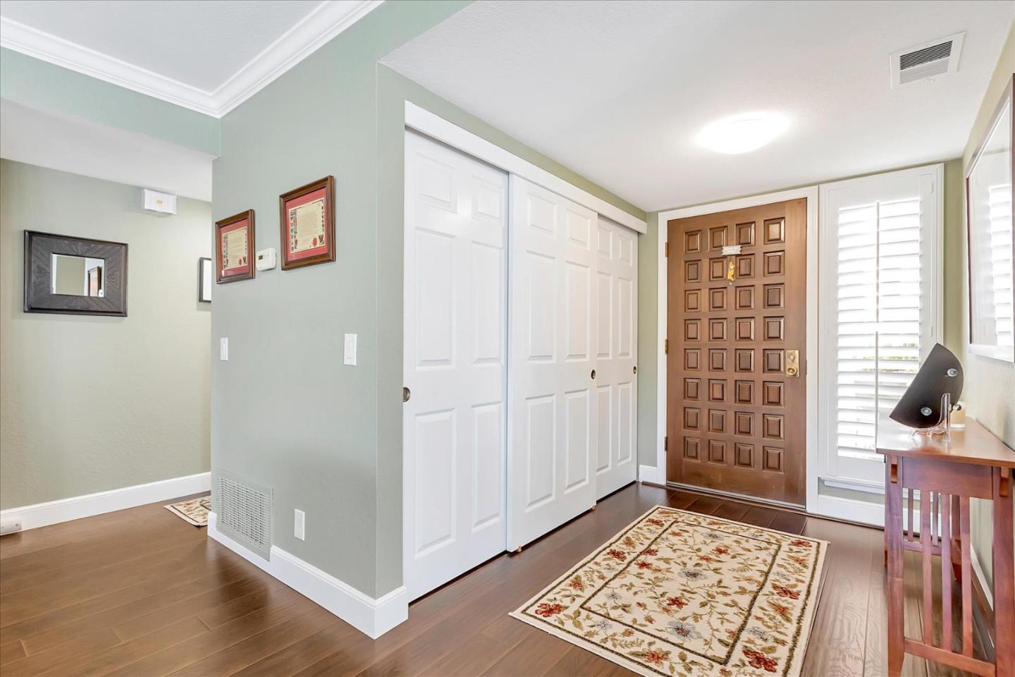 8387 Riesling Way San Jose, CA 95135 - Photo 32 of 52 a view of an empty room with a window