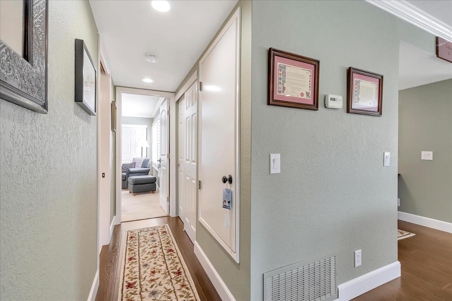 8387 Riesling Way San Jose, CA 95135 - Photo 33 of 52 a bathroom with a glass door shower