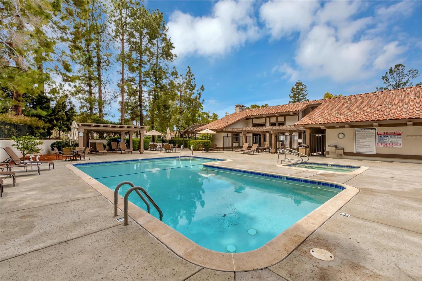 8387 Riesling Way San Jose, CA 95135 - Photo 47 of 52 a view of a house with swimming pool