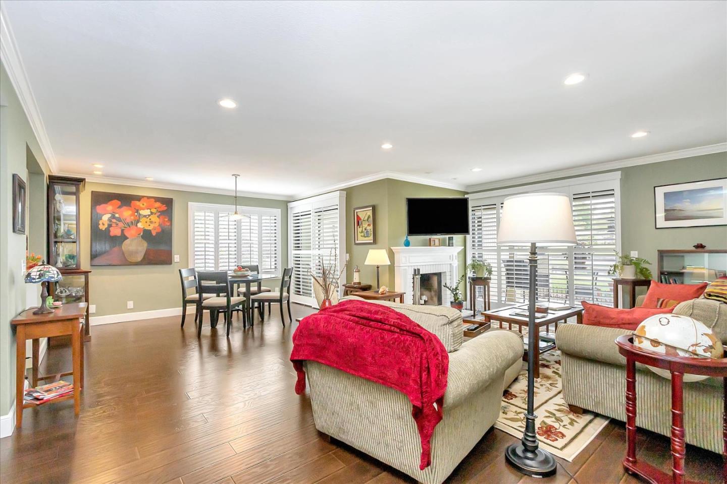 8387 Riesling Way San Jose, CA 95135 - Photo 6 of 52 a living room with furniture and a flat screen tv