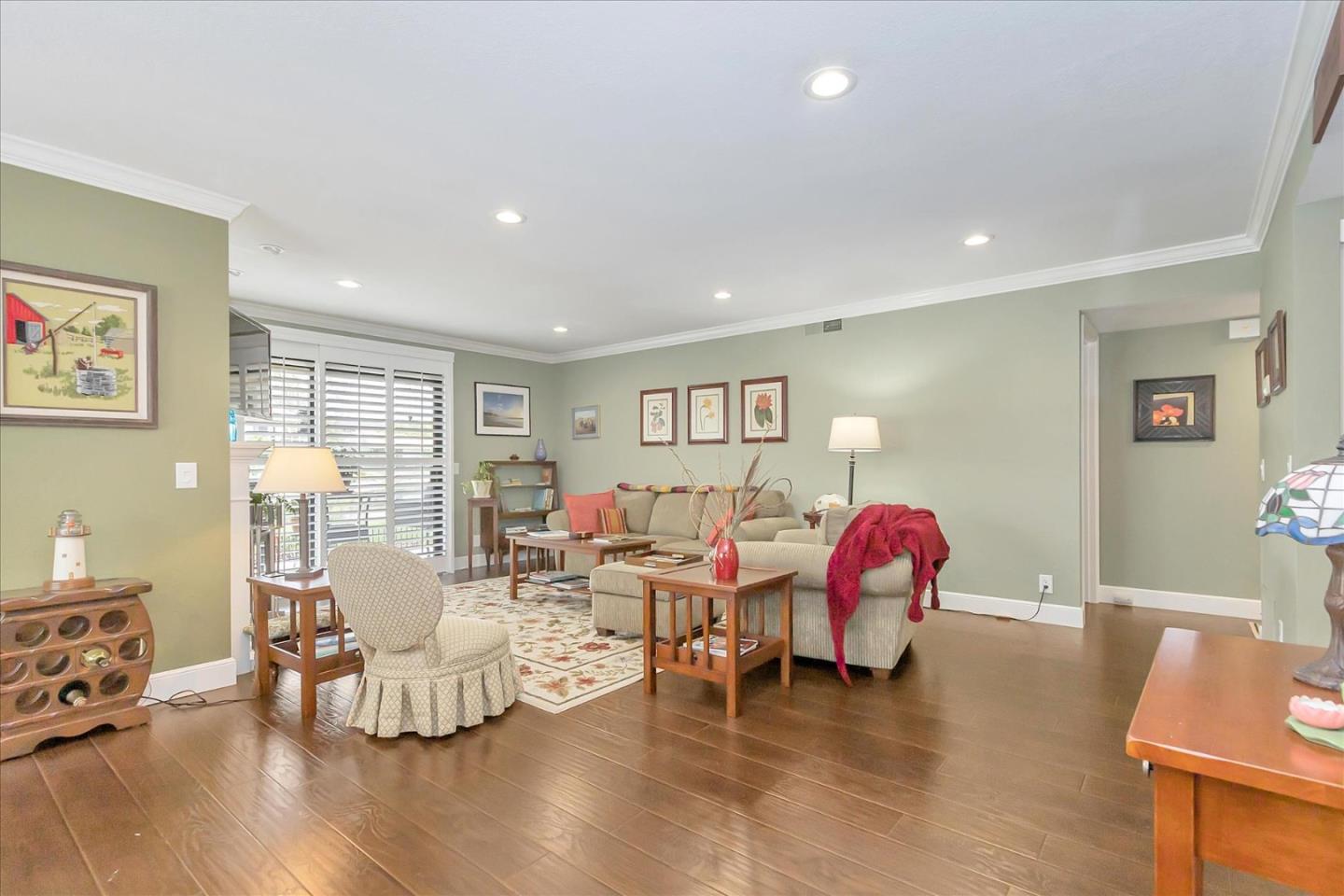 8387 Riesling Way San Jose, CA 95135 - Photo 8 of 52 a living room with furniture and wooden floor