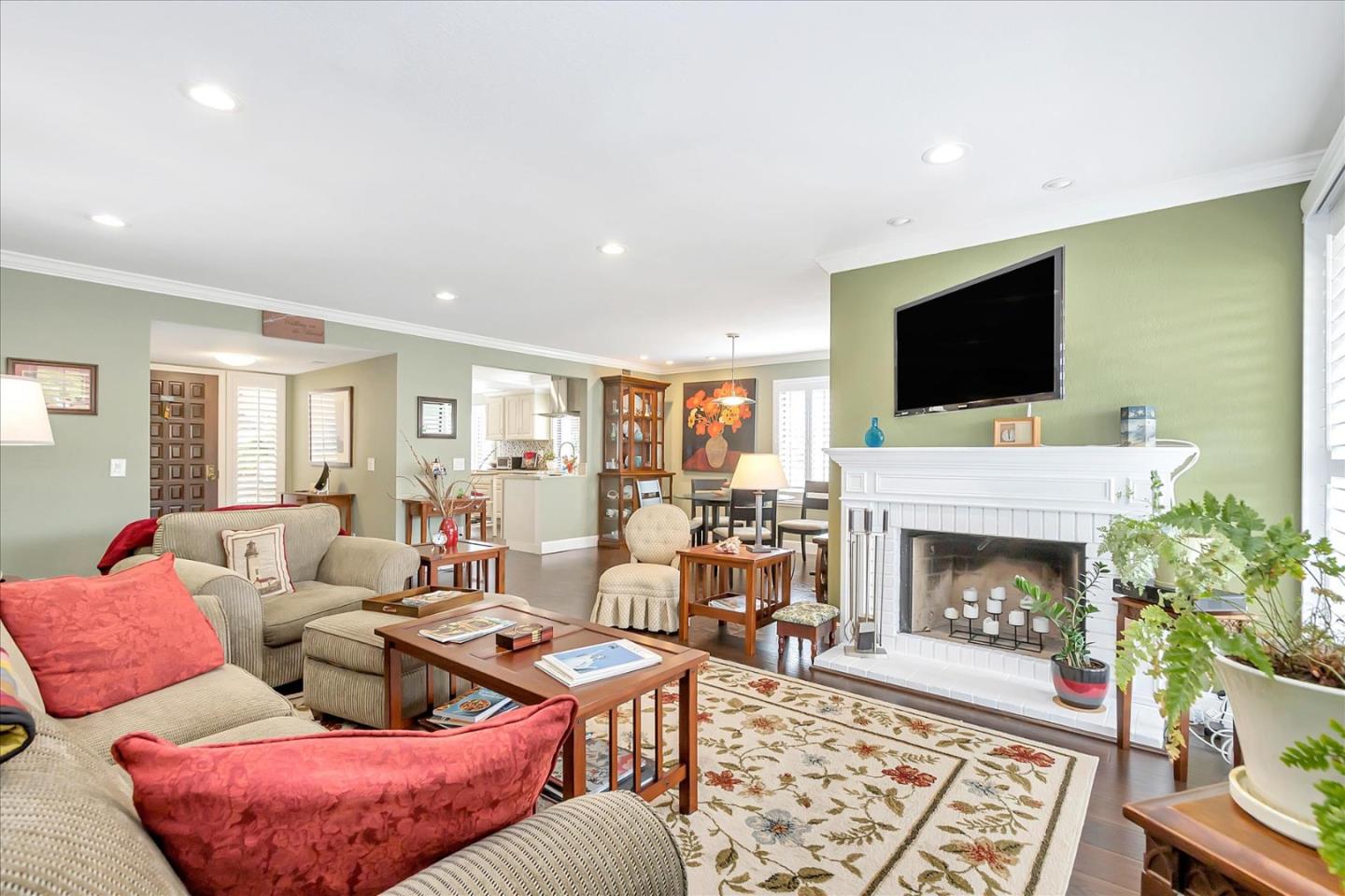 8387 Riesling Way San Jose, CA 95135 - Photo 10 of 52 a living room with furniture fireplace and flat screen tv