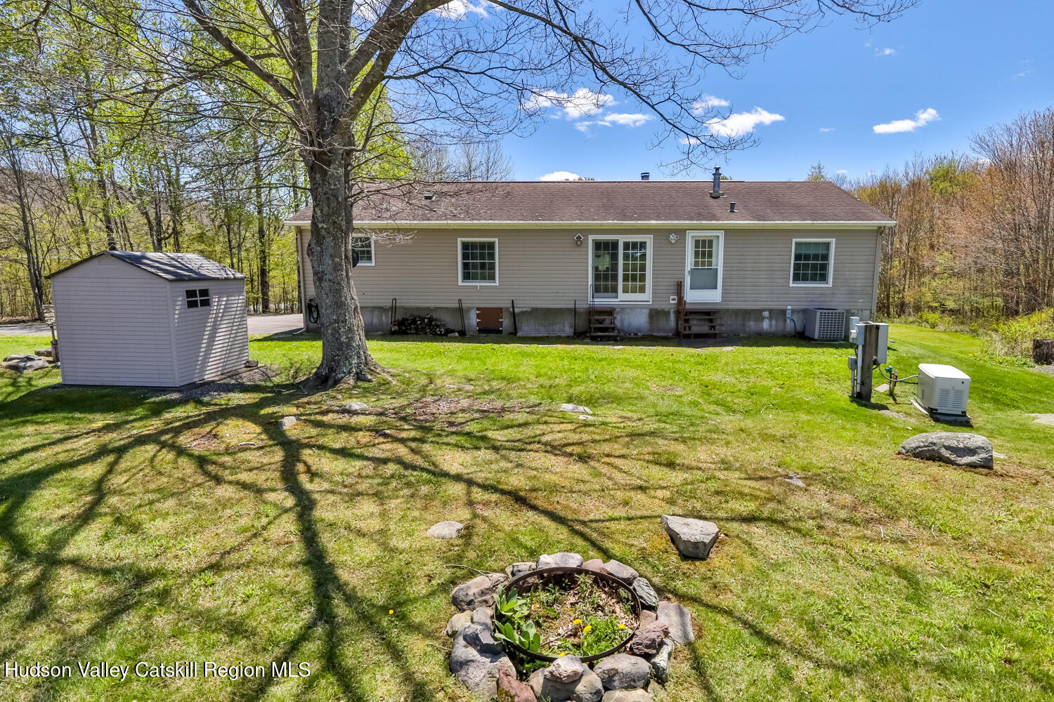 751 Mitchell Hollow Road Windham, NY 12496 - Photo 5 of 37 a view of a house with swimming pool and a yard