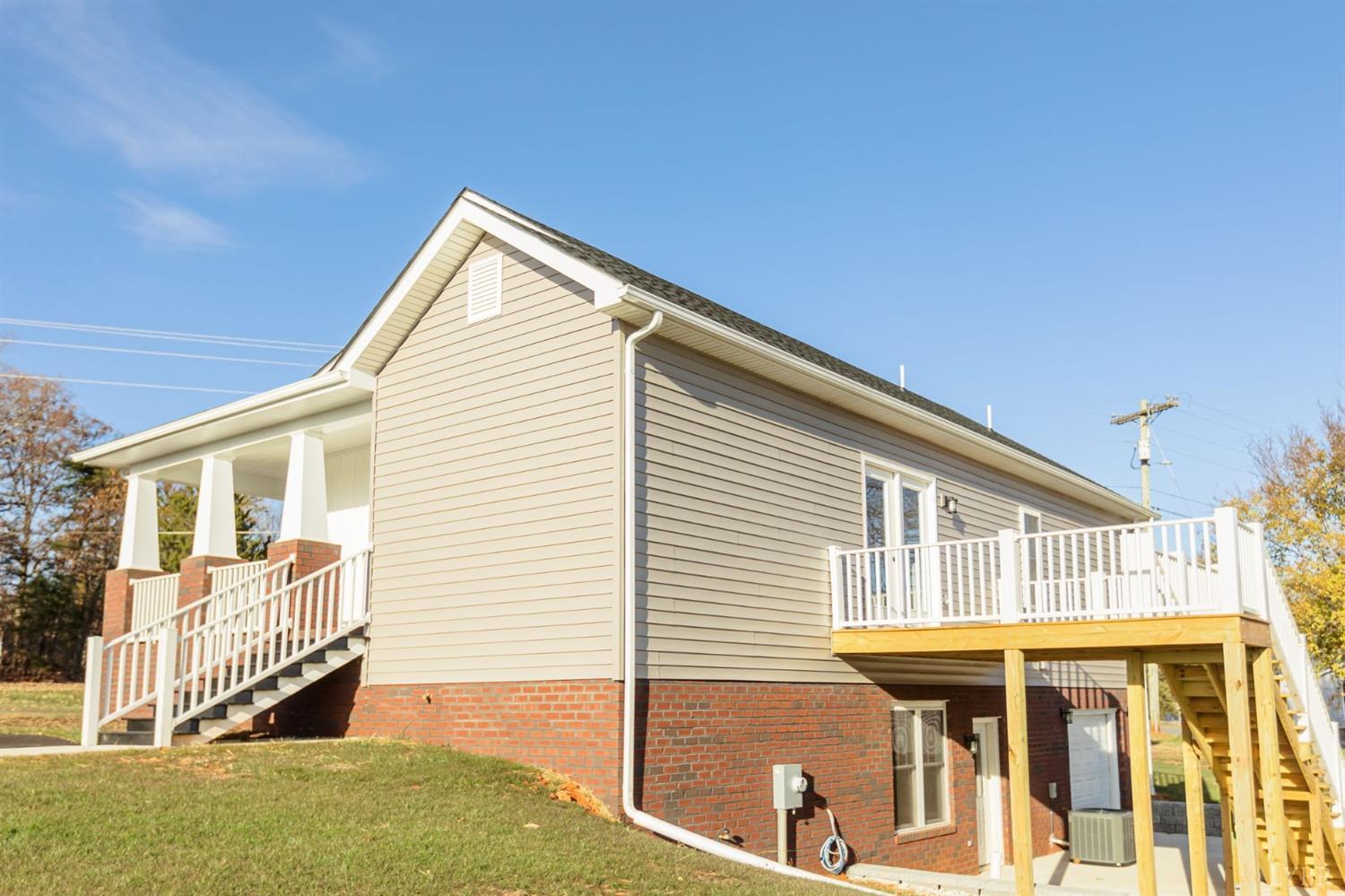 245 Country Estates Road Appomattox, VA 24522 - Photo 40 of 41 a front view of a house with a yard