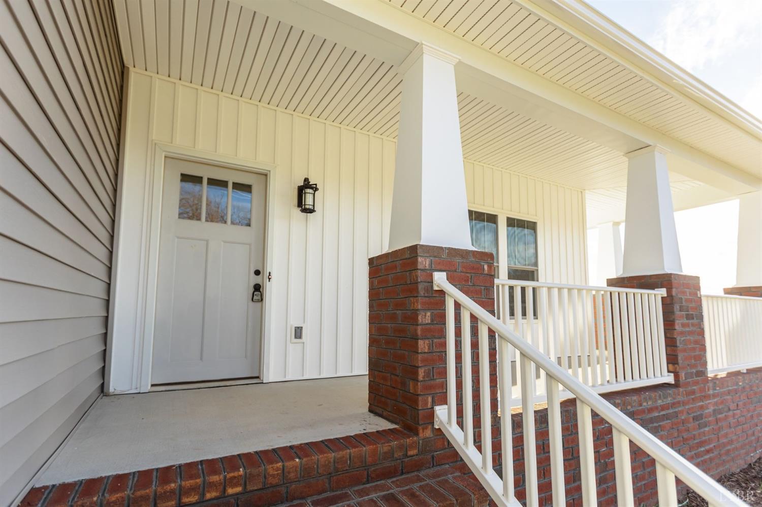 245 Country Estates Road Appomattox, VA 24522 - Photo 5 of 41 a view of a balcony with wooden floor