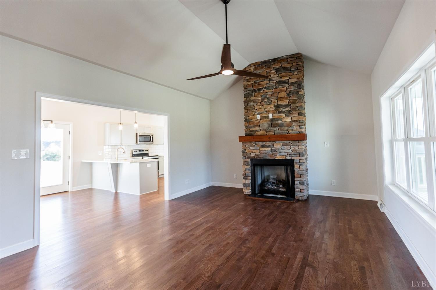 245 Country Estates Road Appomattox, VA 24522 - Photo 7 of 41 a living room with furniture and a fireplace