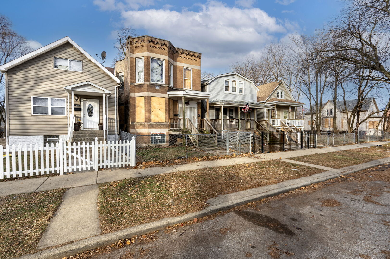 7216 South Green Street Chicago, IL 60621 - Photo 14 of 19 front view of a house with a yard