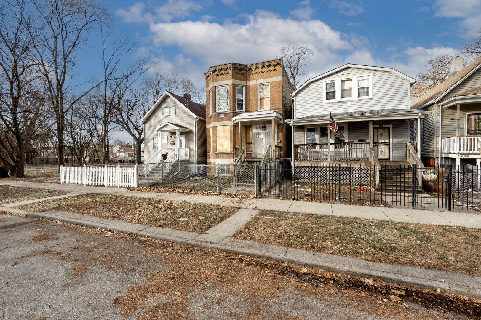 7216 South Green Street Chicago, IL 60621 - Photo 19 of 19 a front view of a house with a yard