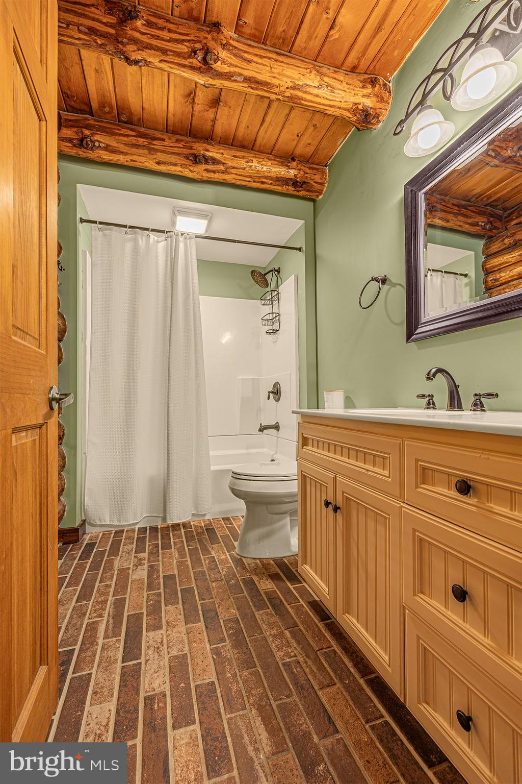 385 Upper Neck Road Pittsgrove, NJ 08318 - Photo 20 of 29 a bathroom with a sink a mirror and a bathtub