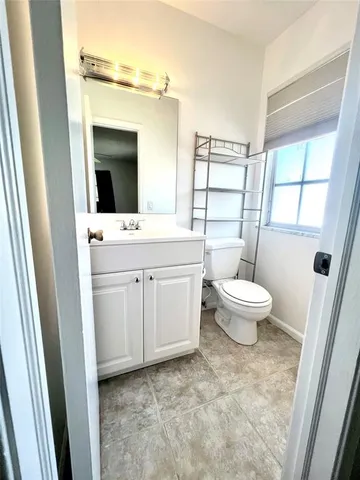 a view of swimming pool with a patio