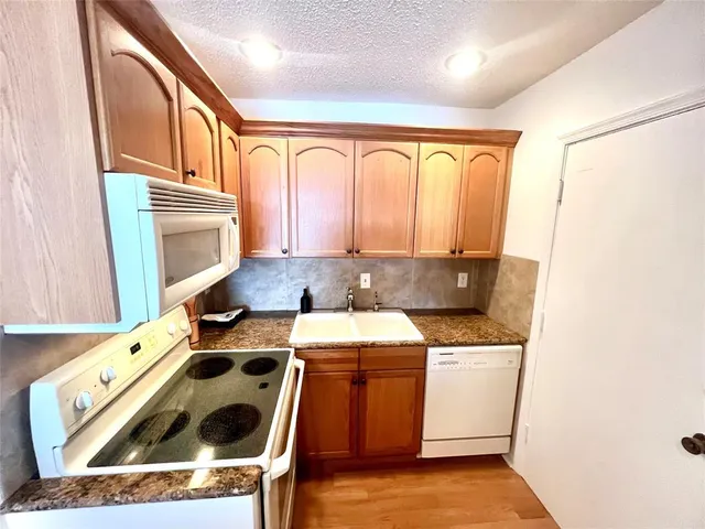 a utility room with washer and dryer
