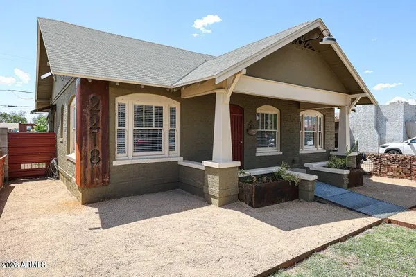 a picture of a book and a white wall