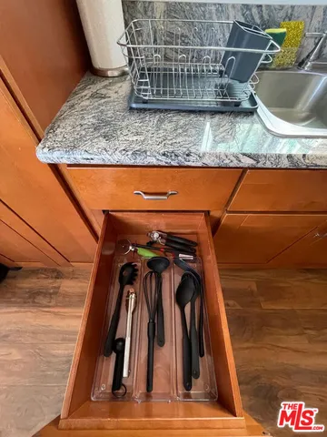 a bedroom with a bed and a projector screen