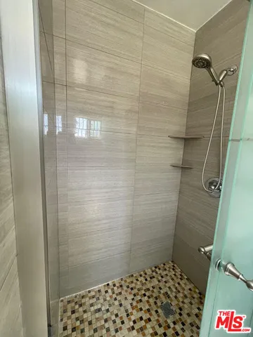 a view of sitting area with furniture and wooden floor