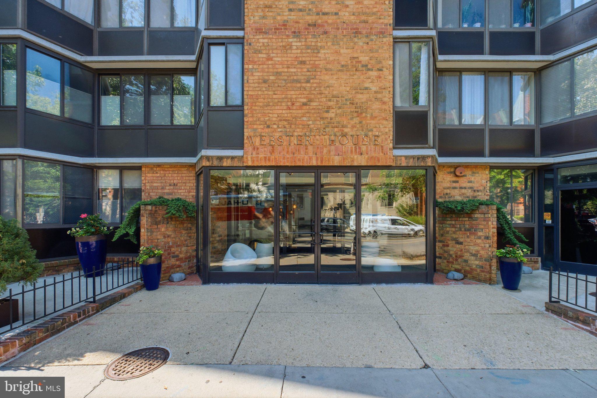 1718 P Street Northwest, Unit 809 Washington, DC 20036 - Photo 23 of 24 Modern brick facade with inviting entrance.
