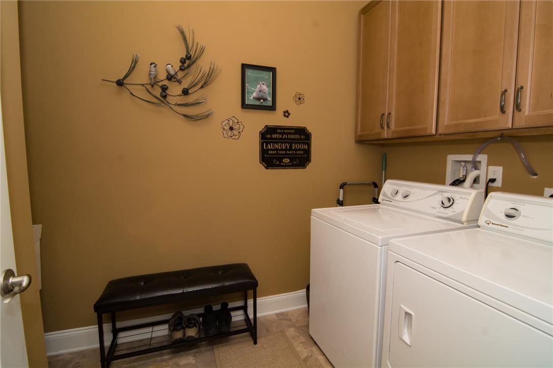 4097 Rutz Lane Allentown, PA 18104 - Photo 40 of 59 Ample built-in cabinetry provides essential storage within this highly functional laundry room.