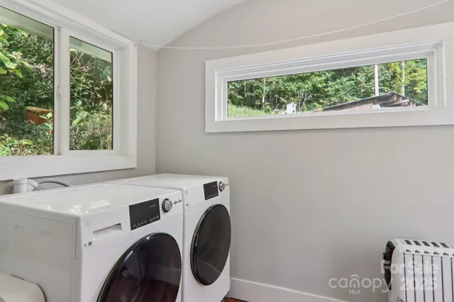 a utility room with dryer and washer