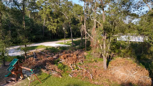 a backyard of a house with lots of green space
