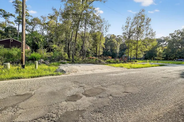a view of a playground with basketball court